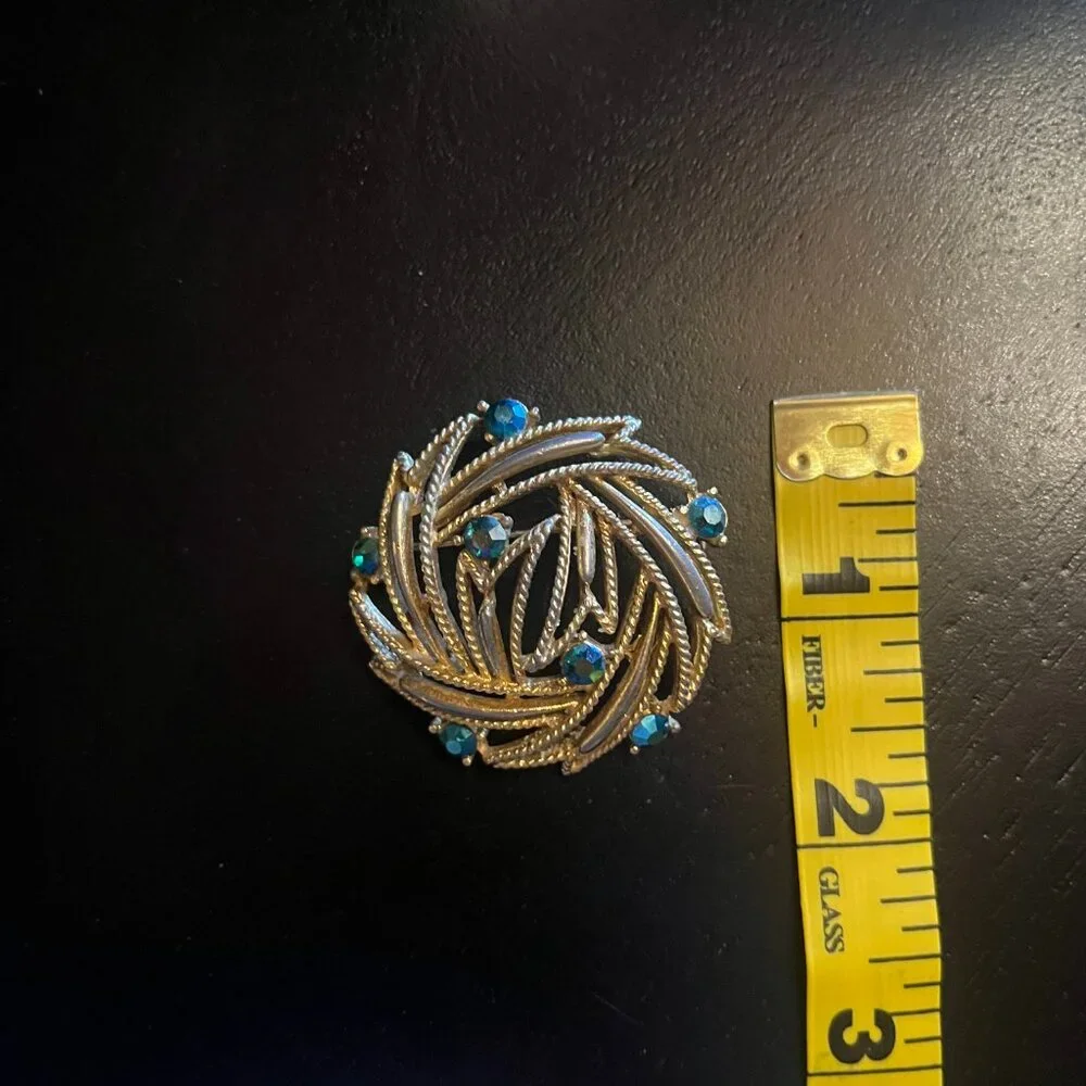 Vintage Gold tone Open Work Blue AB Rhinestone Brooch LISNER
